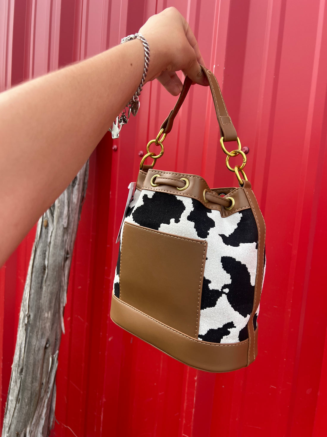 Rodeo Cow Print Crossbody Bucket Bag